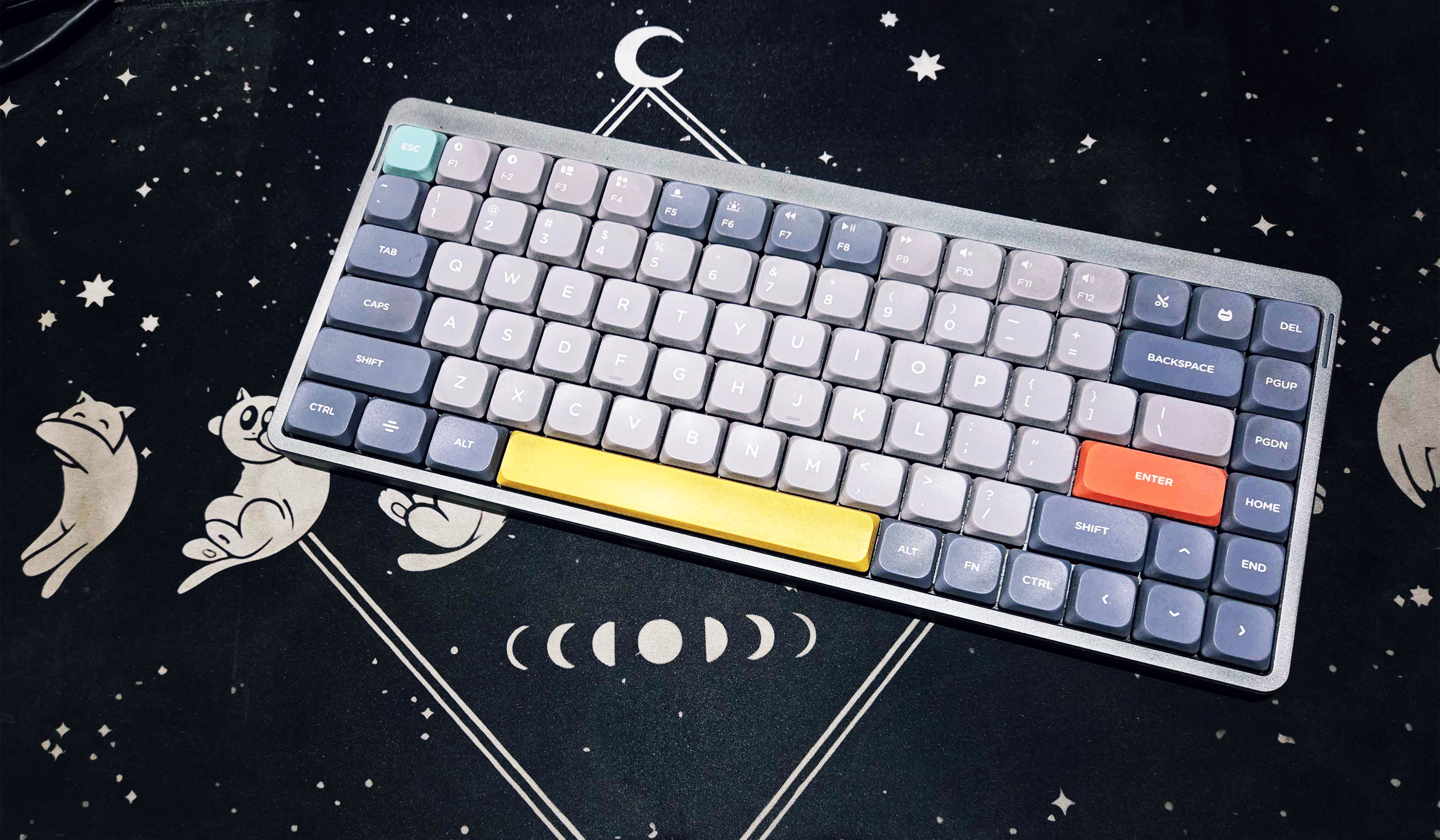My keyboard on a moon-themed desk mat